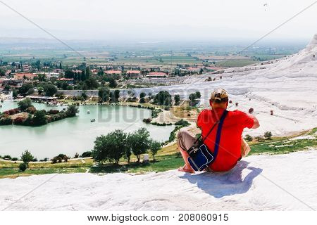 People In Travertine In Pamukkale Cotton Castle Which Is One Of The Unesco World Heritage Site In Tu