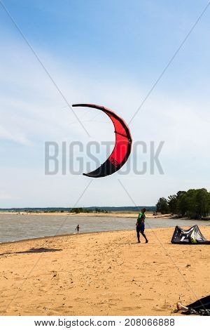 Windsurfing On The Beach Of The Big Izhora Gulf Of Finland