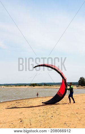 Windsurfing On The Beach Of The Big Izhora Gulf Of Finland