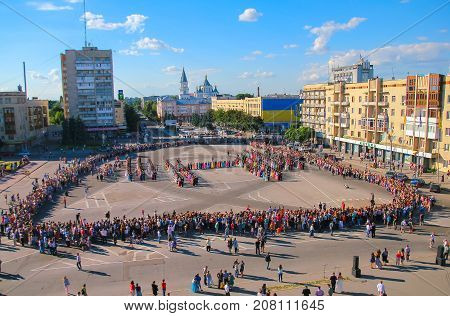 Zhytomyr Ukraine - MAY 19 2014: Military and civil people dancing at the ball at midday