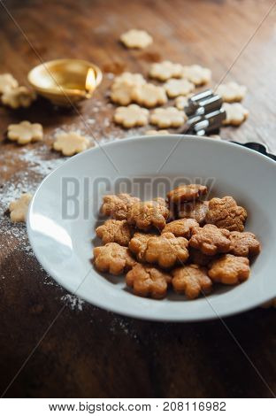 Bowl of deep fried Maida sweet, Shankarpali - a western Indian traditional home made sweet dish usually made during Festival of Diwali.