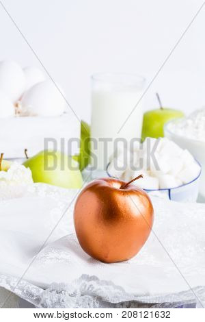 a bronze apple and ingredients for baking