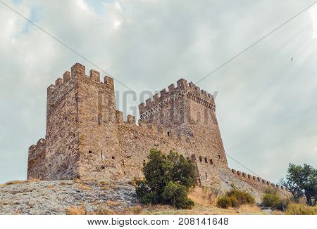 Genoese fortress in Sudak, the Crimea Peninsula, Black sea. Consular castle and the fortification wall of the upper tier. Part of the wall, Museum-reserve 