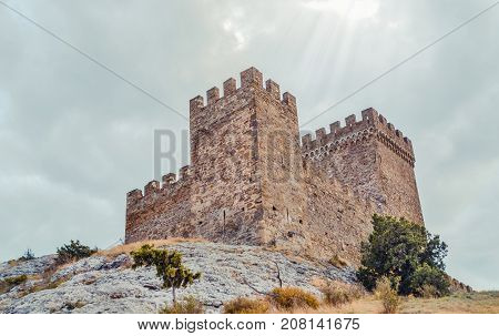 Genoese fortress in Sudak, the Crimea Peninsula, Black sea. Consular castle and the fortification wall of the upper tier. Part of the wall, Museum-reserve 