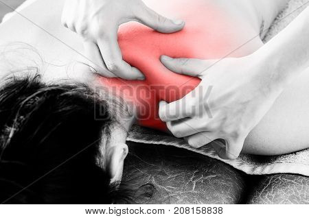 Physiotherapist, Chiropractor Giving A Massage And Stretching Of Subscapularis And Rhomboid To A Pat
