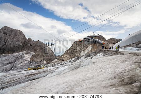 People Hiking Around Dachstein Hunerkogel Mountain Station, Alps, Austria