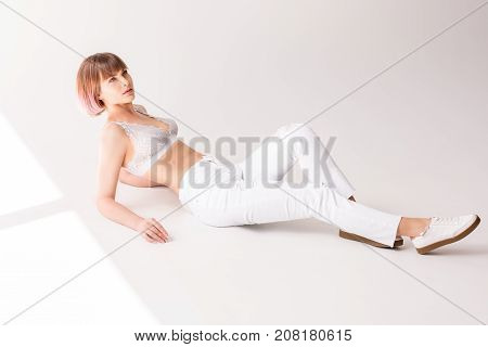 Young Woman Posing On Floor