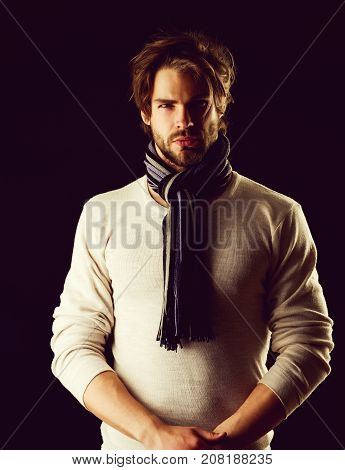 Bearded Macho With Tied Striped Scarf Looking Confidently