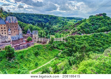 Eltz Castle in Rhineland-Palatinate, Germany. Beautiful landscape with medieval architecture.