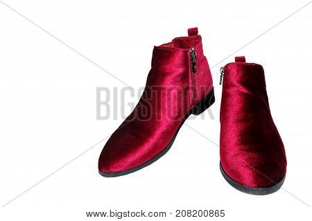 Lady's red ankle boots isolated on white background.
