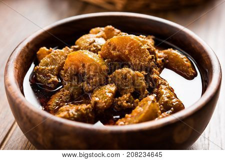 Stock photo of Amla/Avla/Aavla and it's by product called pickle or achar, selective focus
