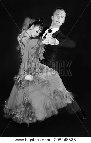 Ballrom Dance Couple In A Dance Pose Isolated On Black Background