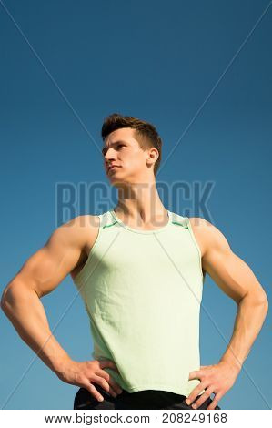 Athlete In Green Tshirt On Sunny Day