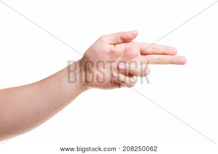 Male hand makes a shot gesture, isolated on white. Close-up.