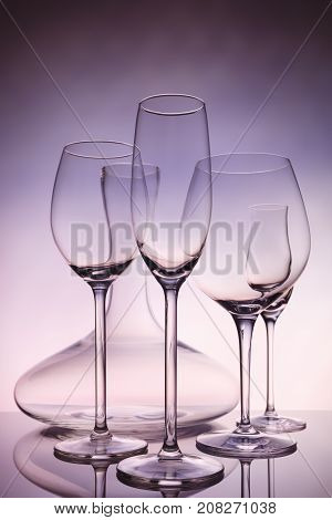 Glassware Selection With Wine, Champagne, Liquour Glasses And Decanter On Creative Background