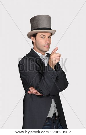 คนที่สวมใส่หมวกและ tailcoat