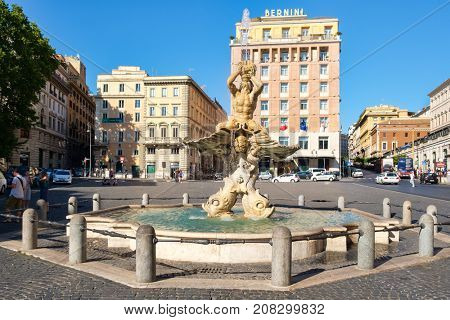 ROME.ITALY - JULY 16, 2017 : The Triton Fountain by Gian Lorenzo Bernini at Piazza Barberini in the historic center of Rome