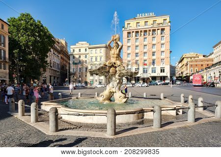 ROME.ITALY - JULY 16, 2017 : The Triton Fountain by Gian Lorenzo Bernini at Piazza Barberini in the historic center of Rome