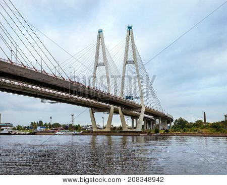 Big Obukhovsky bridge. Cable-stayed fixed bridge across Neva river in St. Petersburg. One of longest road bridges in Russia on gloomy autumn day