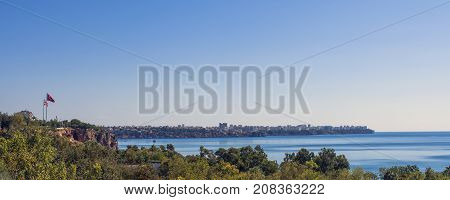 Panoramic view on Antalya city old town Kaleici and Mediterranean Sea from the Beach park. Antalya Turkey.