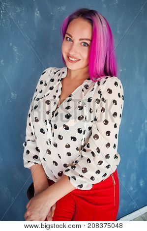 beautiful girl with pink hair posing at photoshoot 1