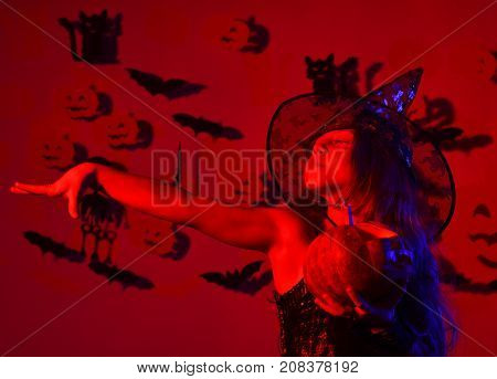 Halloween Party And Decorations Concept. Kid In Spooky Witches Costume