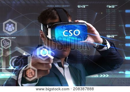 Business, Technology, Internet And Network Concept. Young Businessman Working In Virtual Reality Gla