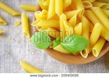Penne Rigate. Macaroni In The Form Of Feathers. Mostaccioli Pasta