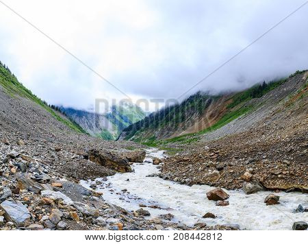 River near Chalaadi glacier in Caucasus mountains in summer in Georgia
