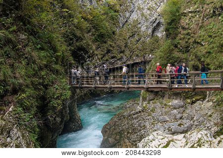 SLOVENIA, SOTESKA VINTGAR- September 30 2017: Nature autumn landscape. Waterfall at Soteska Vintgar Slovenia. The Vintgar Gorge or Bled Gorge. Nature autumn landscape. Waterfall at Soteska Vintgar Slovenia. The Vintgar Gorge or Bled Gorge.