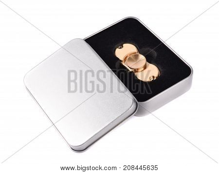 Metallic fidget spiner isolated on white background