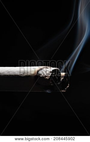Two Smoking Cigarette On Black Background.copy Space