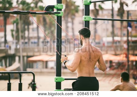 Exercise In The Open Air In The Gymnasium On The Beach Barceloneta On The Shores Of The Mediterranea