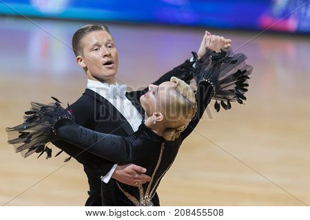 Minsk Belarus-October 7 2017: Dance Couple of Gordeev Ilia and Komarova Daria Performs Adults European Standard Program on WDSF International Capital Cup Minsk- 2017 in October 7 2017 in Minsk Belarus.
