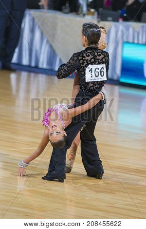 Minsk Belarus-October 7 2017: Dance Couple Of Samadashvili Avtandil and Gogishvili Elene Performs Youth-2 Latin-American Program on WDSF International Capital Cup MinskOctober 72017 MinskBelarus.