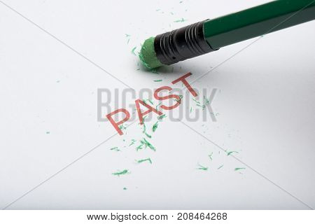 Pencil Erasing The Word 'past' On Paper