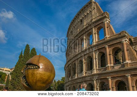 ROME, ITALY - OCTOBER 10, 2017: The famous sculpture of Giuseppe Carta of pomegranate near the Colosseum of Rome, Italy