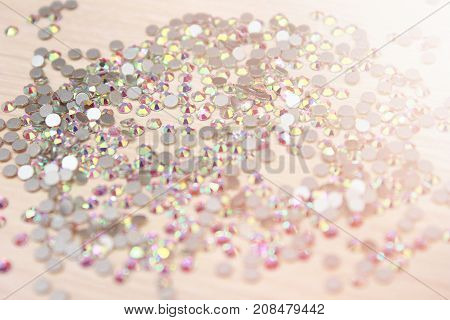 Shiny rhinestones background Close up of a whie all covered with shiny rhinestones