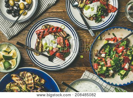 Flat-lay of healthy dinner table setting. 