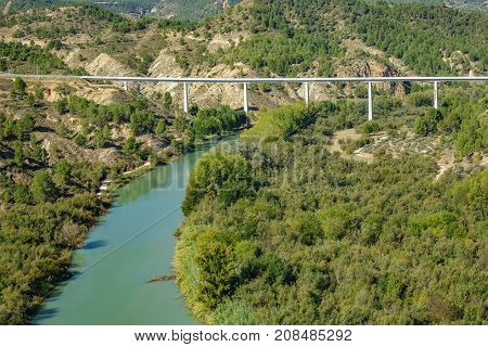 Wide angle view of Cabriel river and bridge