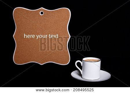 A cup of coffee on a dark background