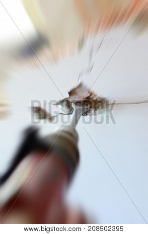 Construction worker using pneumatic hammer construction site concept.