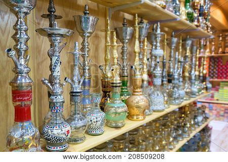 Shelves with hookahs. Oriental shop in Egypt. Close-up.