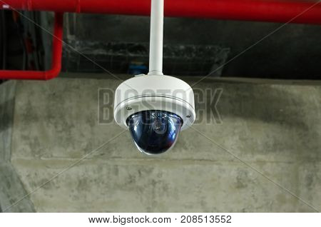 CCTV security indoor camera system operating inside airport or train station surveillance security and safety technology concept