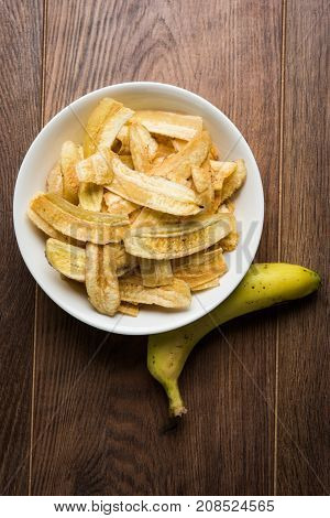Stock Photo of Healthy Homemade Kela or Banana chips or wafers or Plantain Chips, selective focus