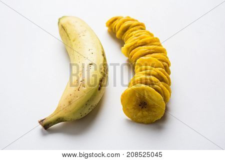 Stock Photo of Healthy Homemade Kela or Banana chips or wafers or Plantain Chips, selective focus