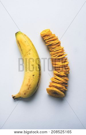 Stock Photo of Healthy Homemade Kela or Banana chips or wafers or Plantain Chips, selective focus