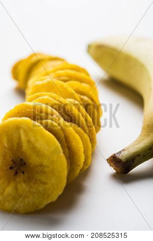 Stock Photo of Healthy Homemade Kela or Banana chips or wafers or Plantain Chips, selective focus