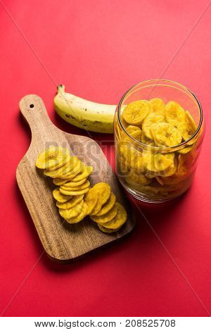 Stock Photo of Healthy Homemade Kela or Banana chips or wafers or Plantain Chips, selective focus