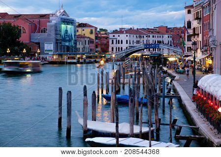 VENICE,ITALY - JULY 26,2017 : The Grand Canal in Venice and the Ponte degli Scalzi at sunset